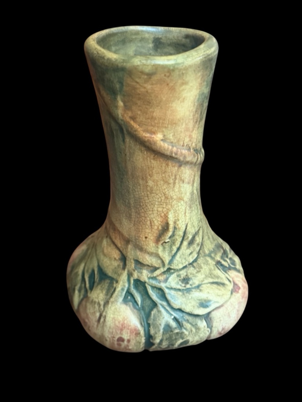 A Weller Pottery Apple Tree bud vase with molded leaves and vine.